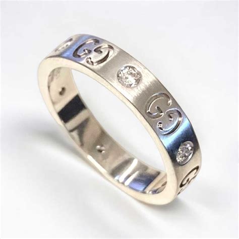 gucci 18ct white gold icon diamond set ring|Gucci gold textured icon ring.